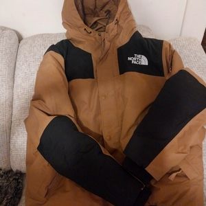 I'm selling a two x north face men's winter coat